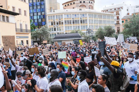 Palma de Mallorca, Spain - June 07 2020: Crowd protesting with banners peacefully against racism and recent US police brutalityのeditorial素材