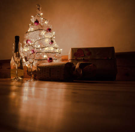 Christmas toast with gifts under the treeの写真素材
