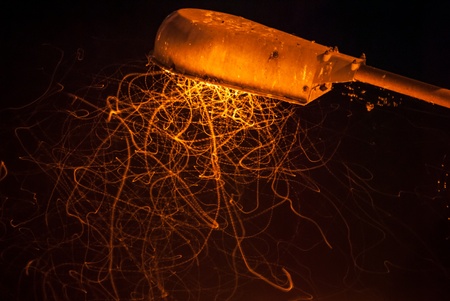 luminous insects flying traces under the streetlightの写真素材