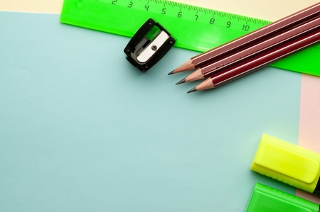 Blue empty sheet with stationery objects の写真素材