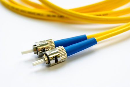 two single-mode optical connectors st-type. front view.