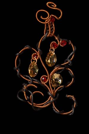 Unique elegant handmade wire-work pendant  with glamour shining jemsの写真素材