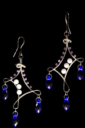 Unique handmade wire-work earrings with blue drops and violet beadsの写真素材