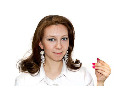 Beautiful women points to the empty businesscard isolated on whiteの写真素材