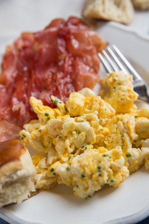 Scrambled eggs with baconの写真素材
