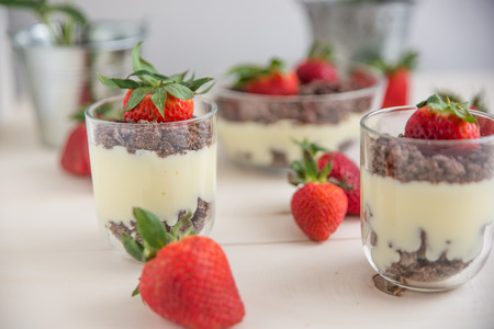 Vanilla pudding dessert with strawberriesの写真素材