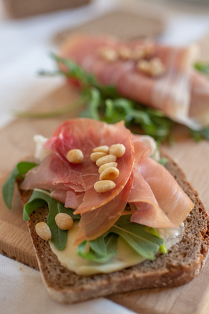 Antipasto cold meat with bread, eggs and saladの写真素材