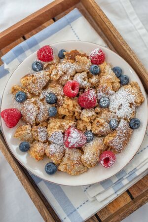 Kaiserschmarrn - traditional austrian pancake dessert with fresh fruitの写真素材