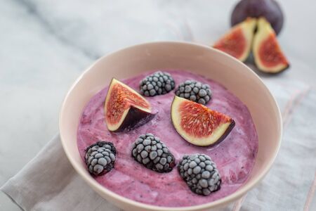 Healthy yogurt with fresh figsの写真素材