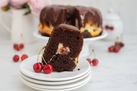 Chocolate cherry sponge cake with chocolate frosting
