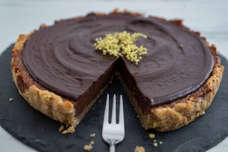 Sweet home made chocolate elderflower cake on a table