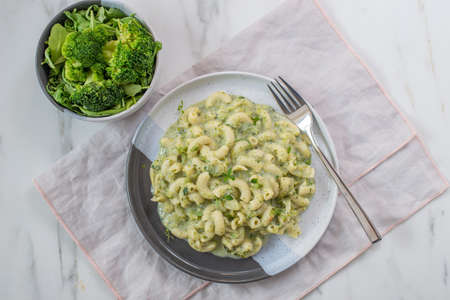 healthy home made vegan fusilli pasta salad with broccoliの写真素材