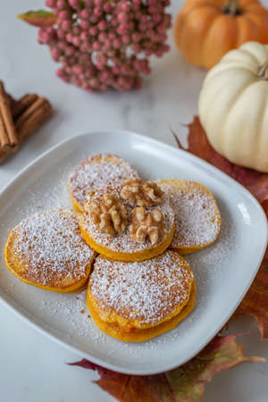 Healthy autumnal breakfast - sweet home made pumpkin pancakes