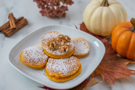 Healthy autumnal breakfast - sweet home made pumpkin pancakes
