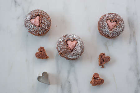 Chocolate Cupcakes decorated with sugar hearts for Valentine's Day