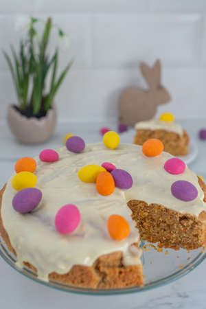 Traditional carrot cake with cream cheese frosting for Easter
