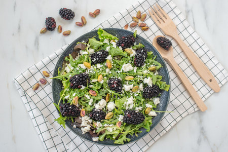summer salad with feta cheese and blackberriesの写真素材