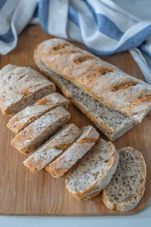 Home made fresh french baguette loafs on a table