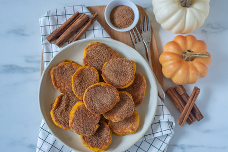 Healthy autumnal breakfast - sweet home made pumpkin pancakesの写真素材