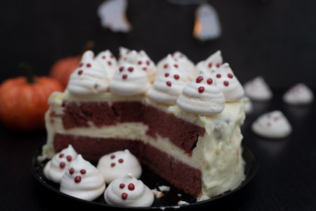 red velvet halloween cake with meringue ghosts
