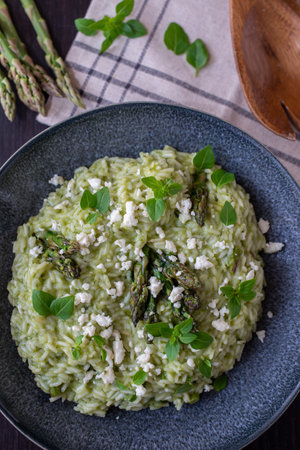 spring foods; Delicious risotto with asparagus and wild garlicの写真素材