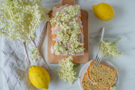 Healthy sweet home made elderflower sponge cake on a tableの写真素材