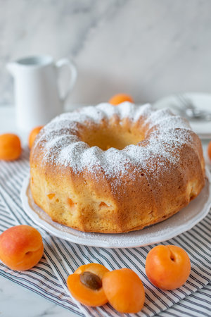 sweet home made vanilla bundt cake with apricotsの写真素材