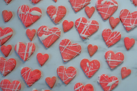 Heart shaped cookies with pink and white icing