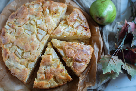 French pear tart or pie with fresh pear fruits