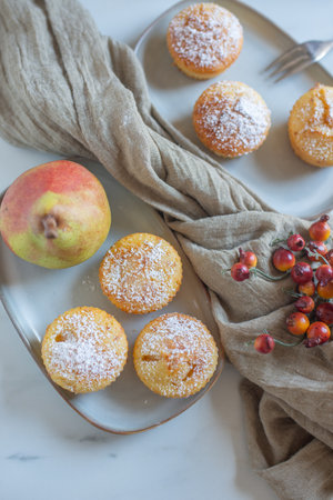 Homemade sweet muffins with pearの写真素材