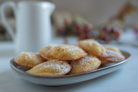 sweet madeleine cookies on table