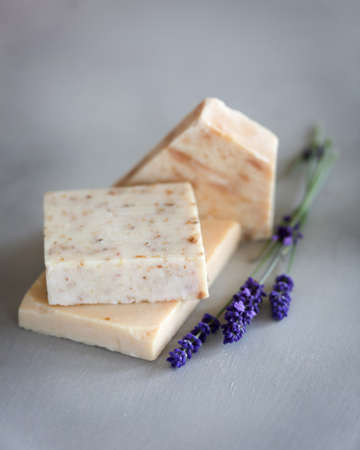 Handmade soap with lavender on a gray background.の写真素材