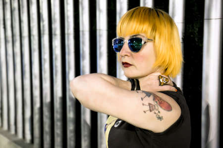 Orange hair girl in the cityの写真素材