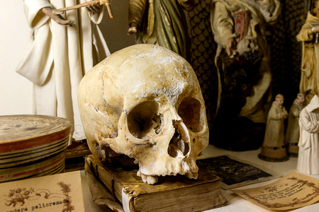 Skull old books on the table and the Middle Ages in Spain, Valdemossaの写真素材