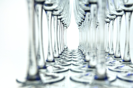 Rows of Empty Wine Glasses white backgroundの写真素材