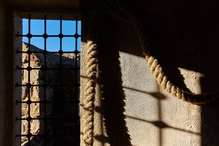 castle window and old rope in Georgiaの写真素材