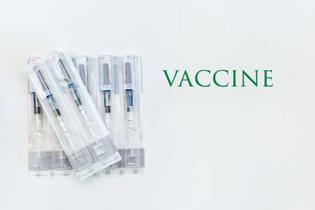 syringe on a white background with the inscription greenの写真素材