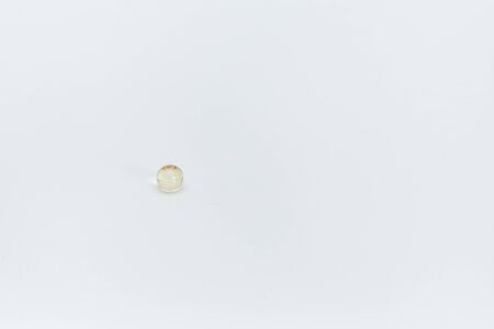 one tablet lies on a white backgroundの写真素材