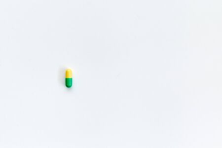 one tablet lies on a white backgroundの写真素材