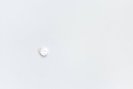 one tablet lies on a white backgroundの写真素材