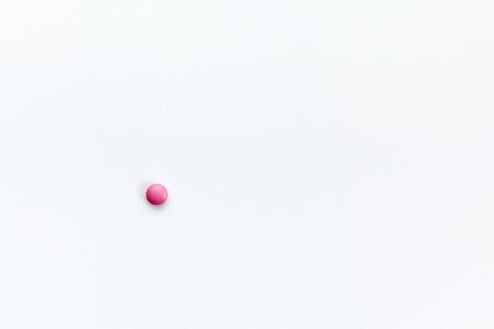 one tablet lies on a white backgroundの写真素材