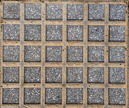 Sidewalk background. Gray squared tiles. Seamless texture. Top view