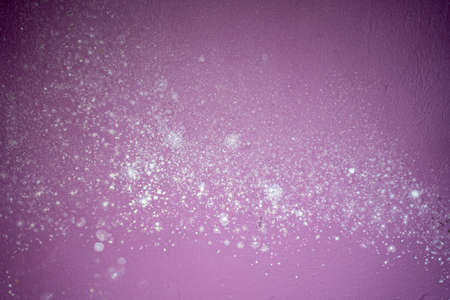 White mold on damp wall. Texture of purple painted facade of home room