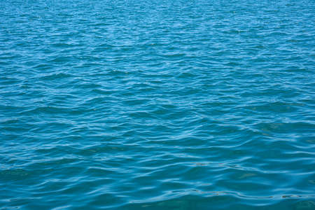 Blue sea waves background. Ocean water texture.の写真素材