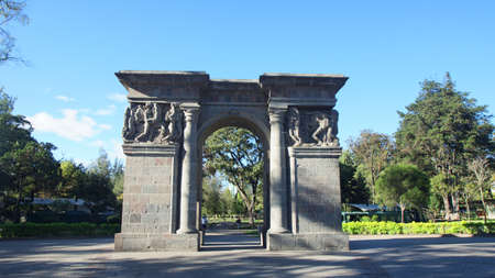 Quito, Pichincha / Ecuador - November 6 2016: Old stone gate at the entrance of the park El Ejido in the north of the city of Quitoのeditorial素材