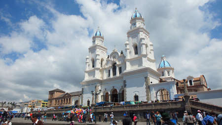 El Quinche, Pichincha / Ecuador - November 13 2016: People walking in front of Sanctuary of the Virgin of El Quinche. On July 8, Pope Francisco I visited this church as part of his agenda in Ecuadorのeditorial素材