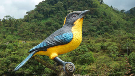 Cosanga, Napo / Ecuador - January 16 2016: Sculpture bird with yellow breast in the town of Cosangaのeditorial素材