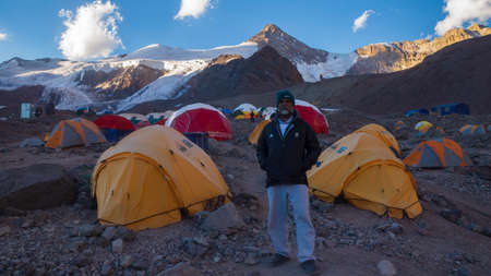 Aconcagua, Mendoza / Argentina, February 12 2014: Tourist walking during the day in Plaza de Mulas,...
