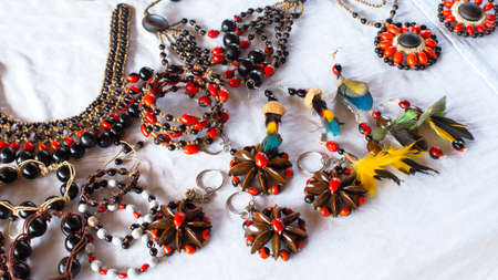 Lago Agrio, Sucumbios / Ecuador - February 20 2020: Necklaces and bracelets made from seeds by women from the Cofan Dureno millennium community located on the edge of the Aguarico riverのeditorial素材