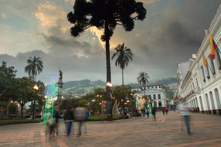 Quito, Pichincha, Ecuador - January 1 2022: Tourists walking in the big square with Christmas decorations located in the historic center of the city of Quitoのeditorial素材